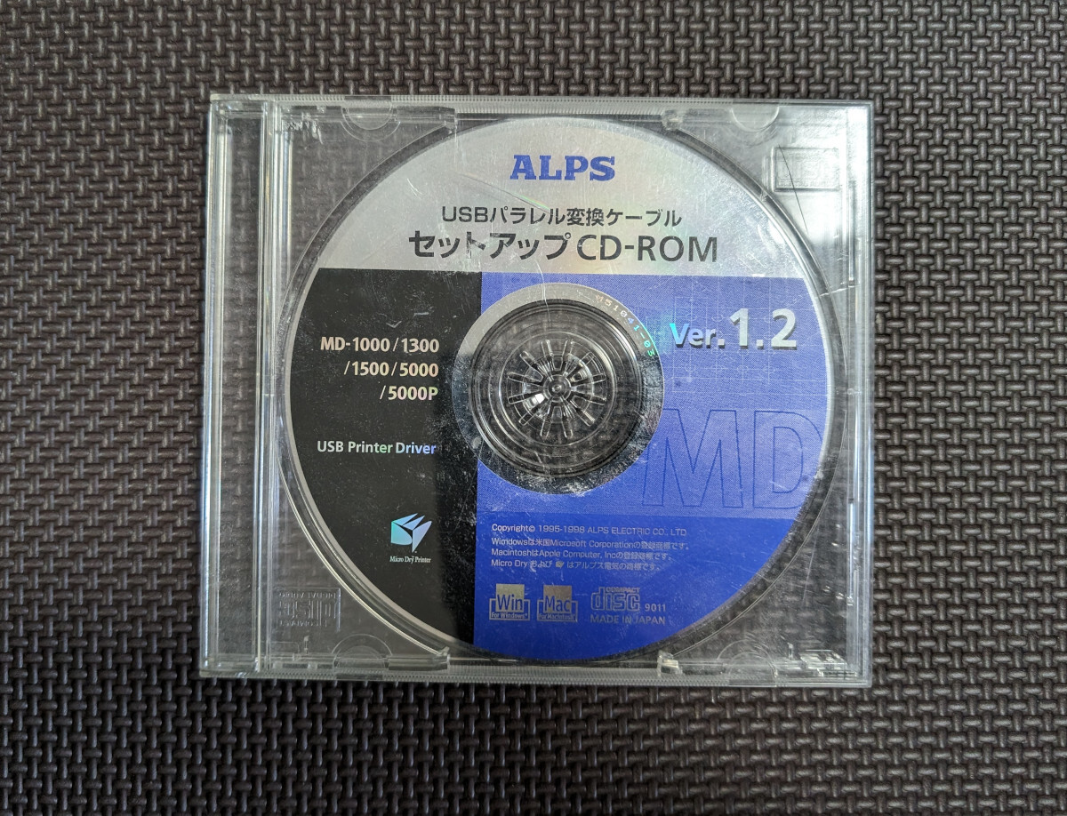 ALPS製 USBパラレル変換ケーブルセットアップCD-ROM Ver.1.2 Win/Mac用 USBプリンタドライバ MD-1000/MD-1300/MD-1500/MD-5000/MD-5000P用 の画像1