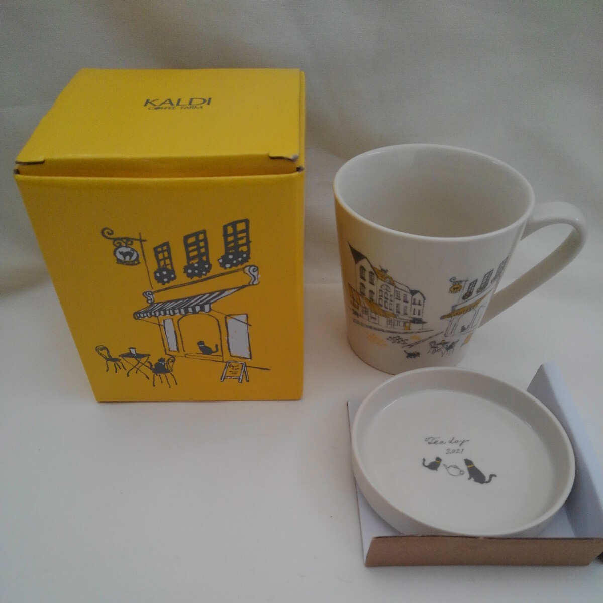 KALDI　COFFEE　FARM　カルディ　Tea　day　2021　ネコ　オリジナルマグカップ+ふた（ソーサー）　未使用_こちらが商品のすべてです