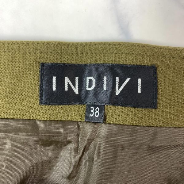 INDIVI インディヴィ ボタン付きフレアスカートカーキカジュアル 飾りボタン 両サイドポケット有 38 C8672_画像7