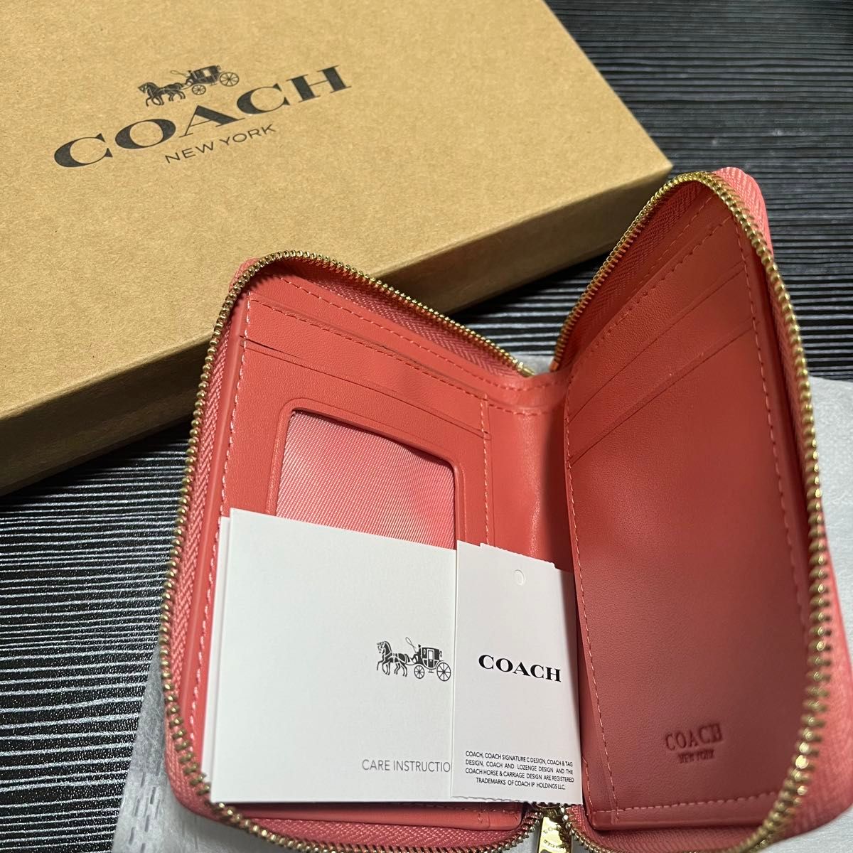 COACH コーチ 二つ折り財布 ピンク シグネチャー レディース 新品