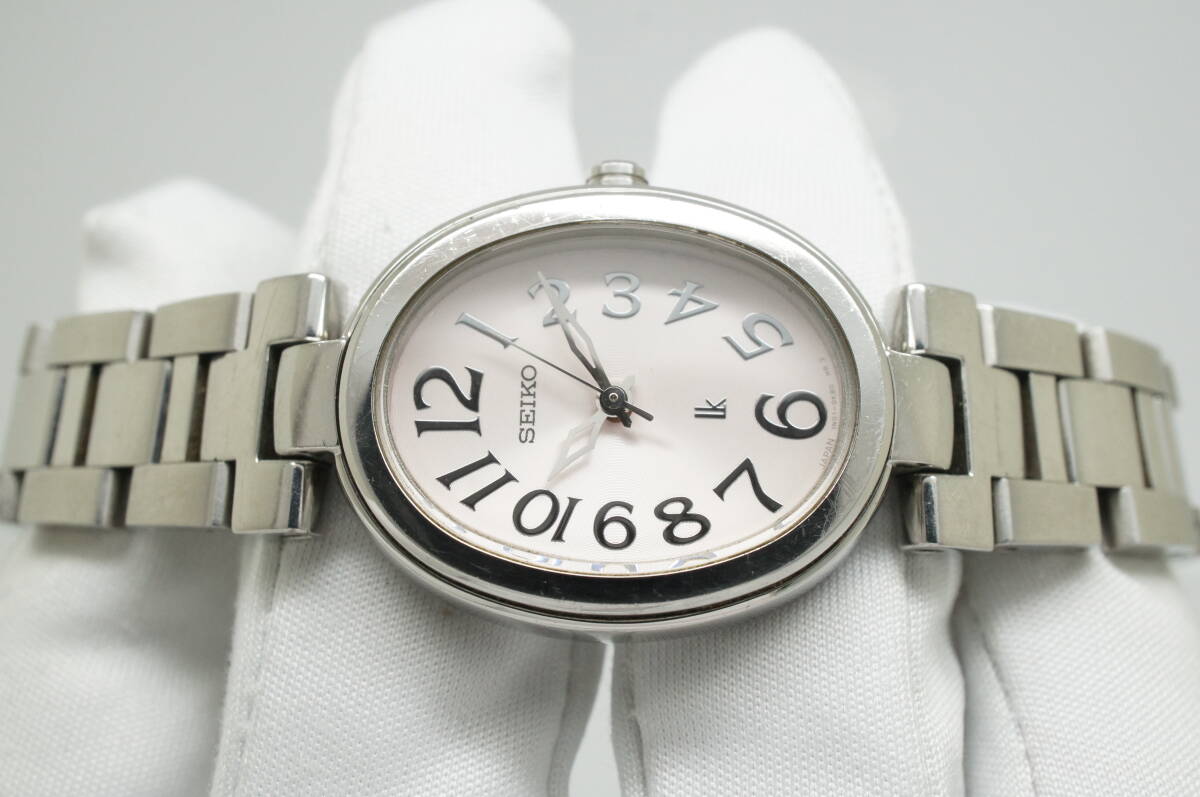 C79* работа хороший SEIKO Seiko LUKIA Lucia 1N01-0ET0 овальный type свет розовый циферблат сделано в Японии женские наручные часы серебряный кварц 