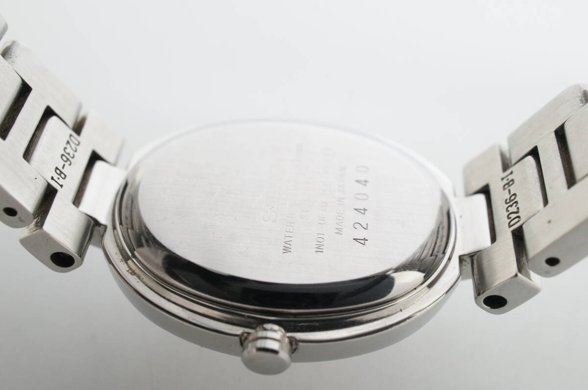 C79●作動良好 SEIKO セイコー LUKIA ルキア 1N01-0ET0 オーバル型 ライトピンク文字盤 日本製 レディース腕時計 シルバー クォーツ_画像9