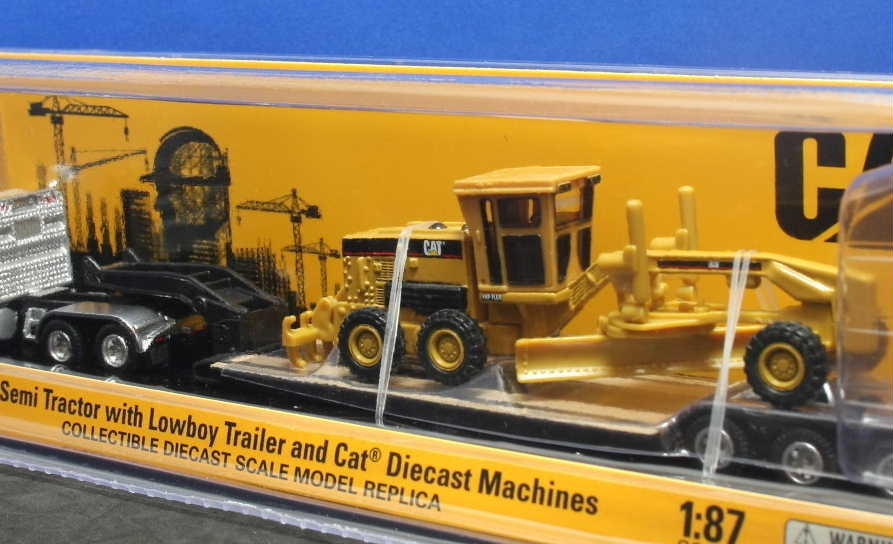 1/87 Cat CT660tei cab tractor (Cat 163H motor grader loading low Boy trailer attaching )