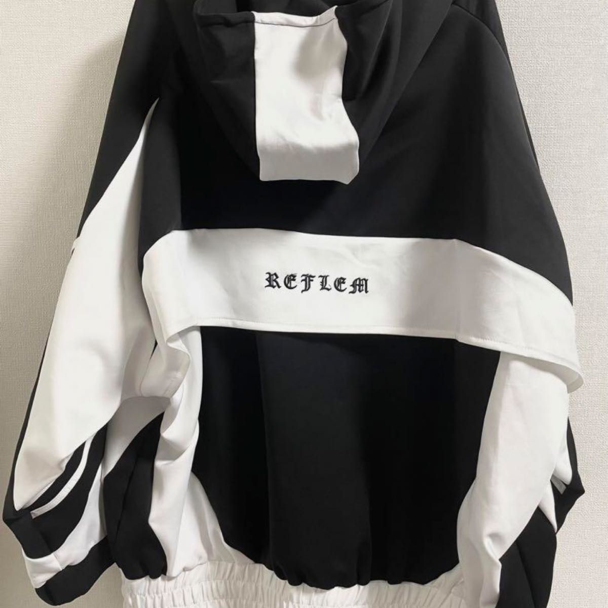 REFLEM/レフレム』BIGアーチ切替ハイネックジャージパーカー REFLEM/レフレム』BIGアーチ切替ハイネックジャージパーカー