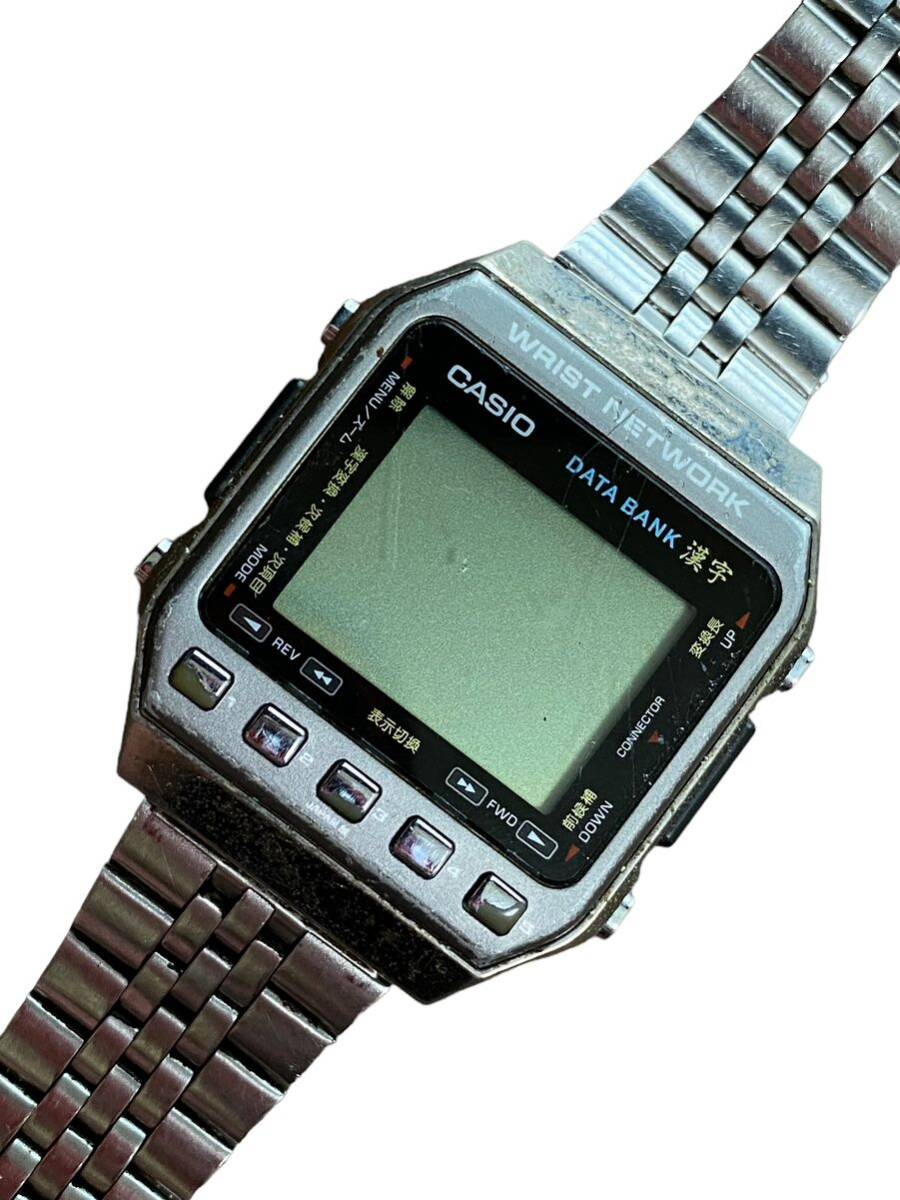 20645 CASIO カシオ DATA BANK データバンク 漢字 DKW-100 ユニセックス 腕時計 時計 デジタル ヴィンテージ クォーツ ステンレス ジャンク_画像1