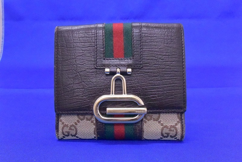 グッチ GUCCI 高級ブランドの魅力 ミドルサイズが使いやすい GGシェリーライン Wホックウォレット 二つ折り財布 両面財布 131848_画像1