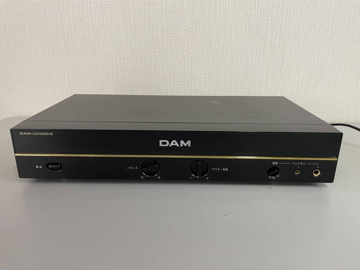 西高μD東京直接大歓迎【通電確認のみジャンク品】 第一興商 カラオケ機器 DAM-AD5000G ステレオデジタルパワーアンプ 通信カラオケアンプ_画像1