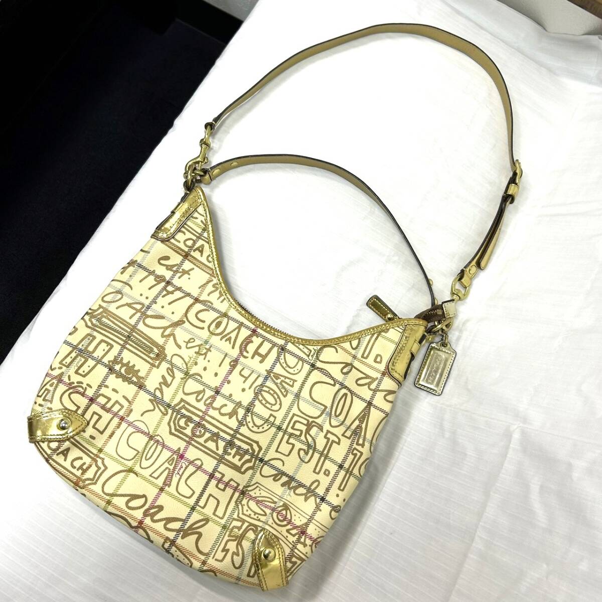 10730★1円スタート COACH コーチ ハンドバッグ 鞄 ゴールド系 金具 ショルダーバッグ 2WAY 英語 内側ピンク 金色 L0868-13309 ブランド _画像1