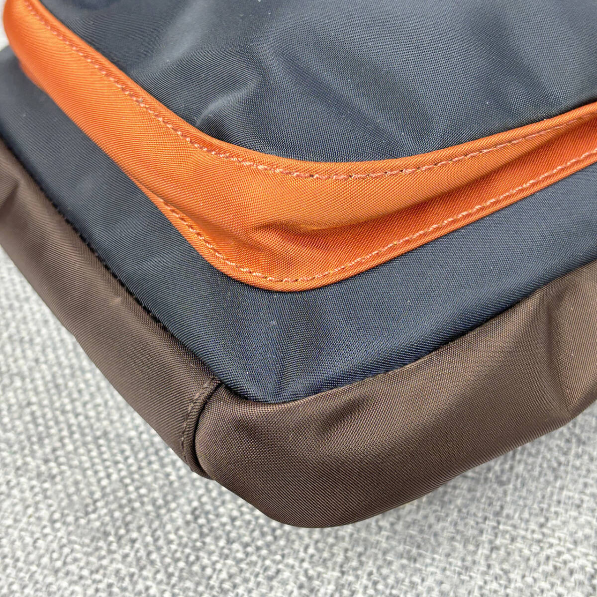  unused *Paul Smith Paul Smith men's body bag PSN310 nylon & original leather navy blue × dense brown × orange 