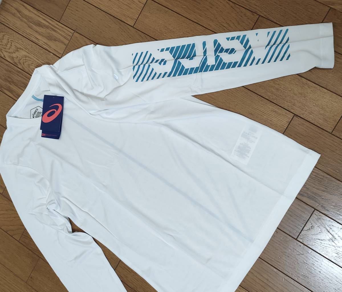 (物48)　定価5,500円　新品　アシックス　ロングTシャツ　ソリューションダイロングスリーブトップ 　2031A560　白　メンズＭ_画像1