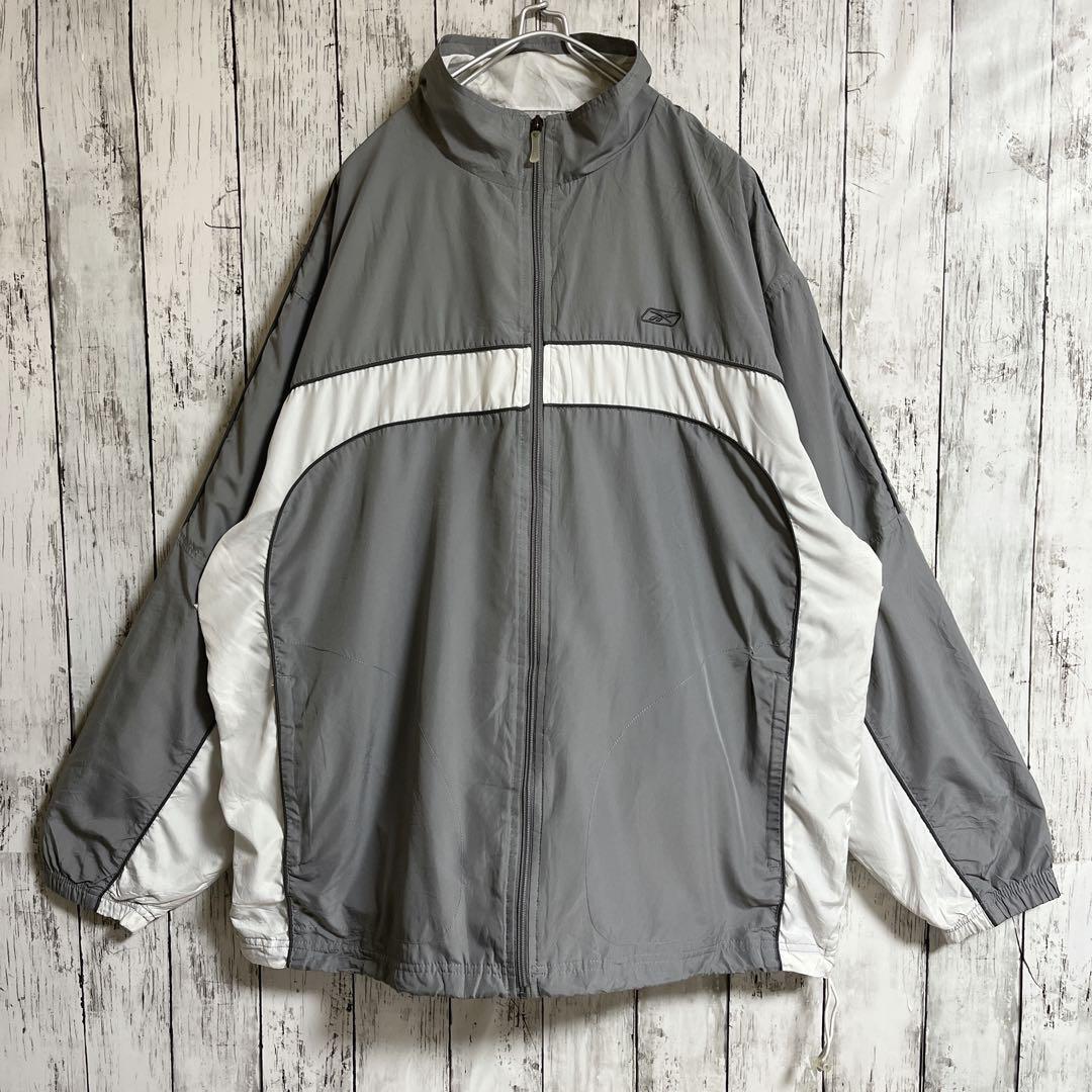 90's Reebok リーボック ナイロンジャケット グレー 2XL ワンポイント 刺ロゴ 90年代ヴィンテージ US古着 アメカジ HTK3499