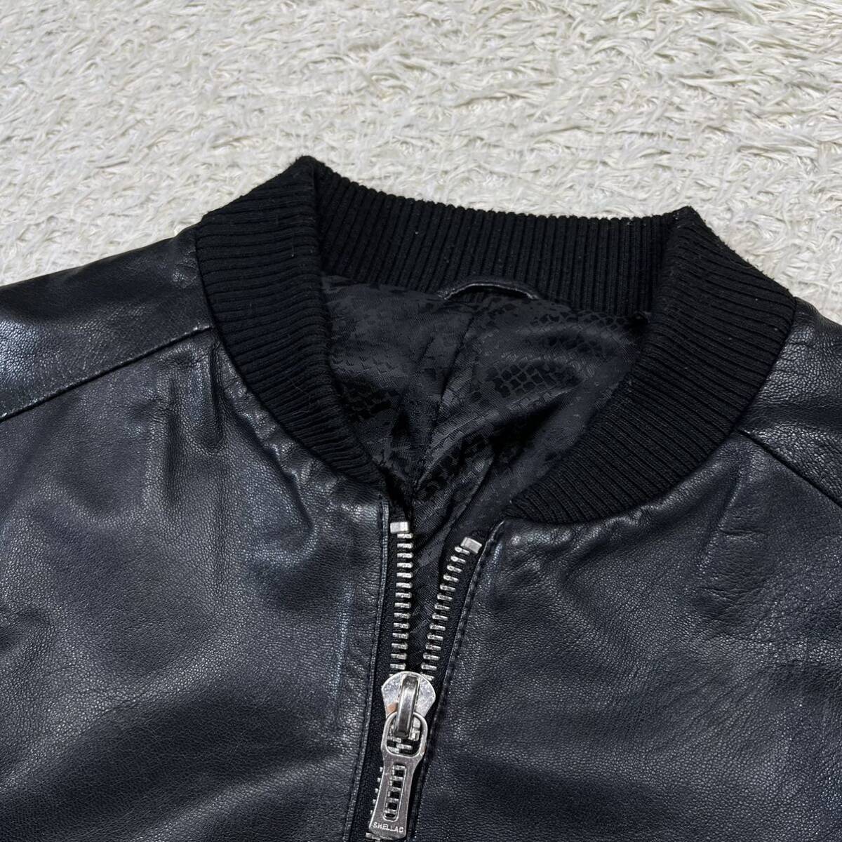  shellac [. height. go-to leather ]SHELLAC leather jacket Rider's blouson .. leather original leather python print black black 