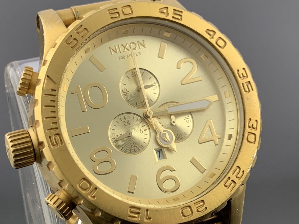 [A1278]1円～☆メンズ腕時計 クォーツ ニクソン NIXON クロノグラフ THE51-30 ゴールドカラー 動作品_画像2