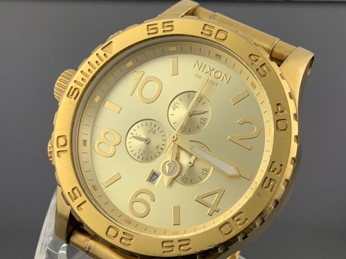 [A1278]1円～☆メンズ腕時計 クォーツ ニクソン NIXON クロノグラフ THE51-30 ゴールドカラー 動作品の画像1