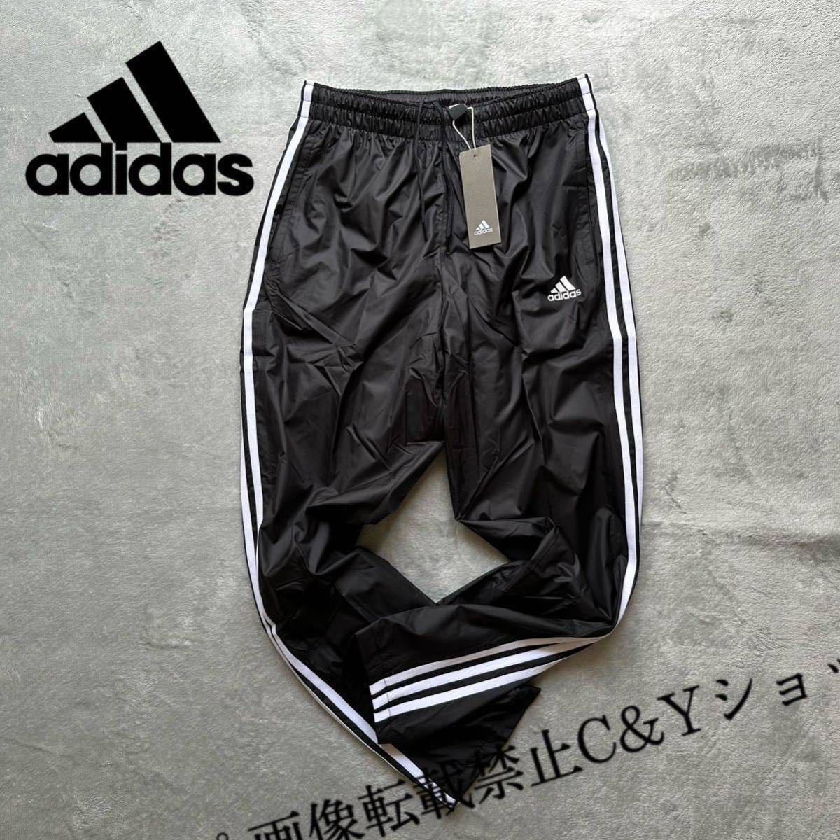 格安送料 Mサイズ 新品 adidas アディダス ウィンドパンツ ウィンドブレーカー 裏起毛 トラックパンツ 黒 ブラック ランニング GE0428_画像1