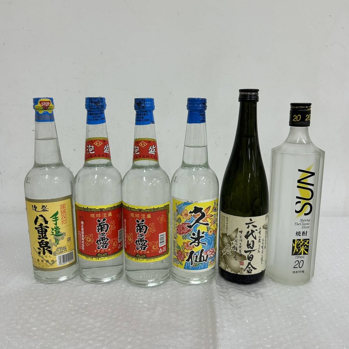 J033(6905)-633【愛知県のみ発送、同梱不可】お酒 焼酎 泡盛 6本まとめ 約6.9kg 菊之露 2本 焼酎 SUN 燦 /六代目百合 / 久米仙/ 八重泉_画像1