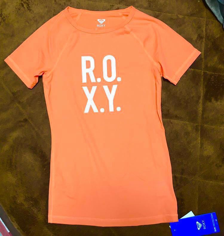 Неиспользованный Roxy Roxy Rush Guard Lawseme Ladies xs Orange Neon Fluorscent Plaging Sprink