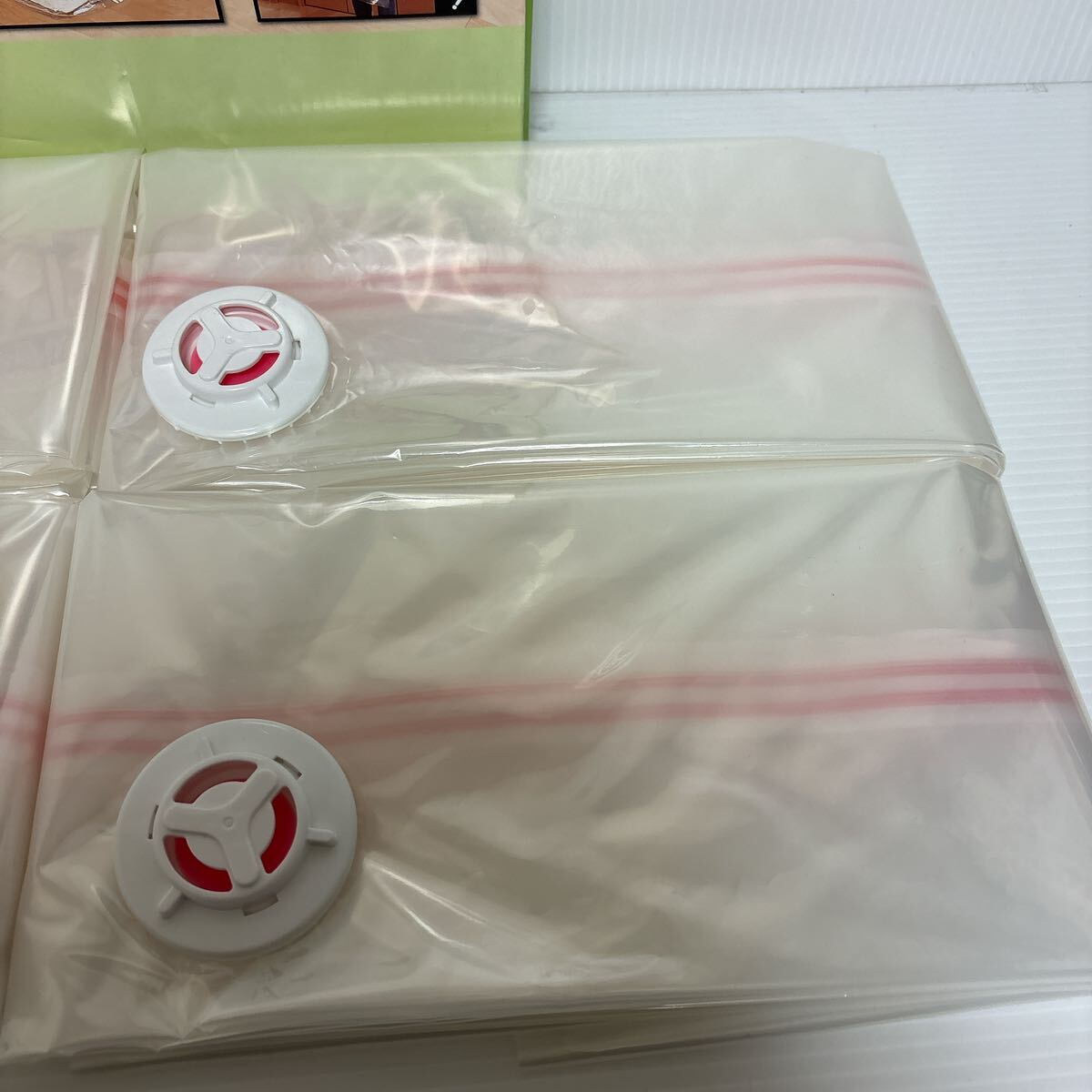  breaking the seal ending unused goods CT mites .. inserting ... futon vacuum bag 4 sheets entering approximately 100×110.H00217 vacuum bag fastener type S-109