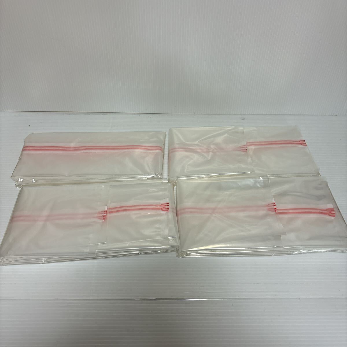  breaking the seal ending unused goods CT mites .. inserting ... futon vacuum bag 4 sheets entering approximately 100×110.H00217 vacuum bag fastener type S-109