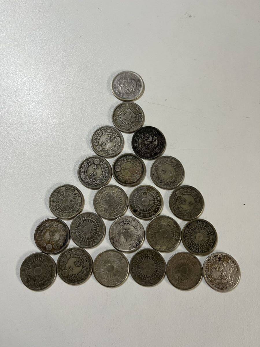  old coin asahi day 10 sen silver coin . summarize 21 sheets 