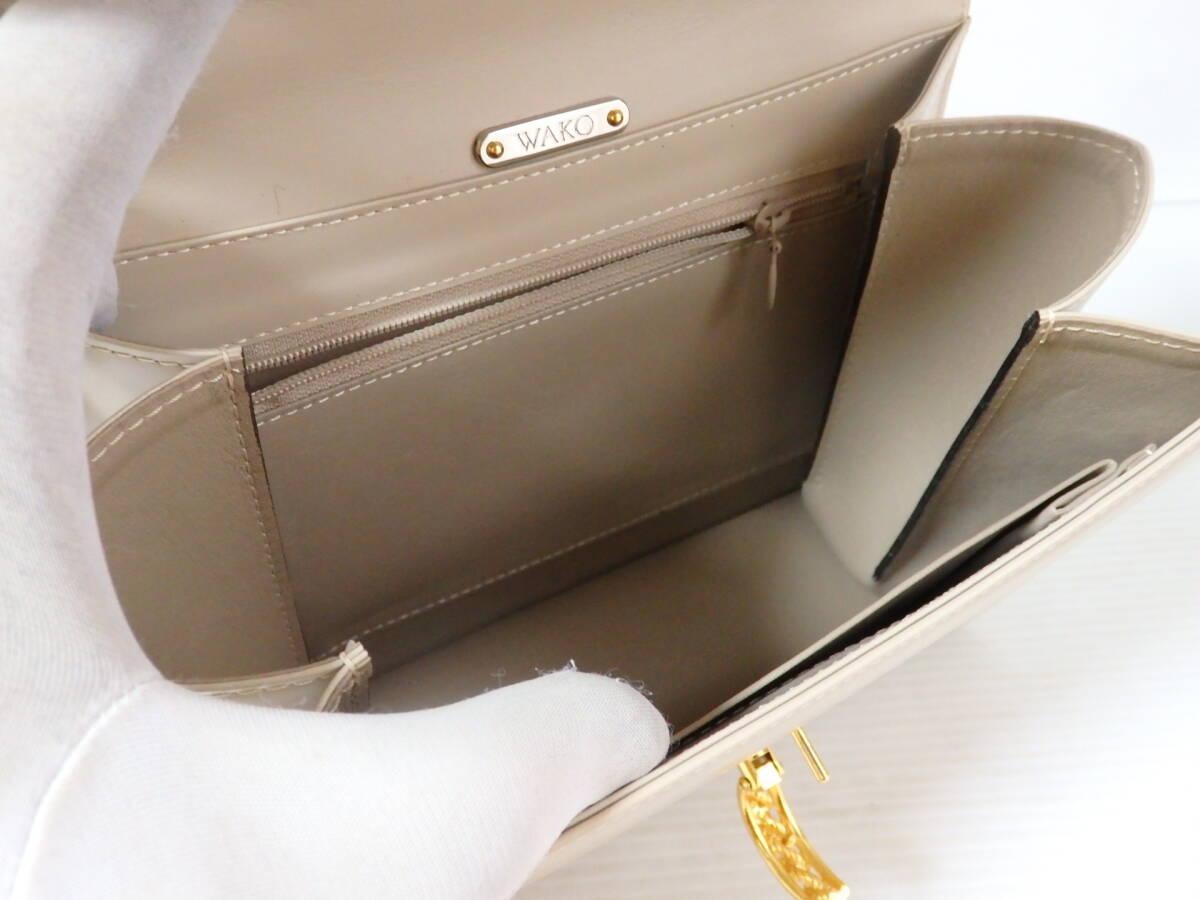 < подлинный товар прекрасный товар WAKO Гиндза Wako ручная сумочка формальный кожа Gold металлические принадлежности wako- белый >7.6.11 * нестандартный 710 иен *