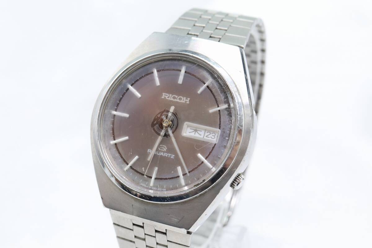 [W126-581] operation goods battery replaced RICOH RIQUARTZ Ricoh li quarts wristwatch 580519 men's [ postage nationwide equal 185 jpy ]