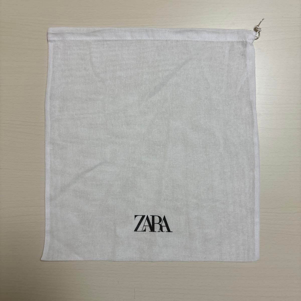 ZARA ザラ　巾着　ポーチ　ホワイト　保存袋　白