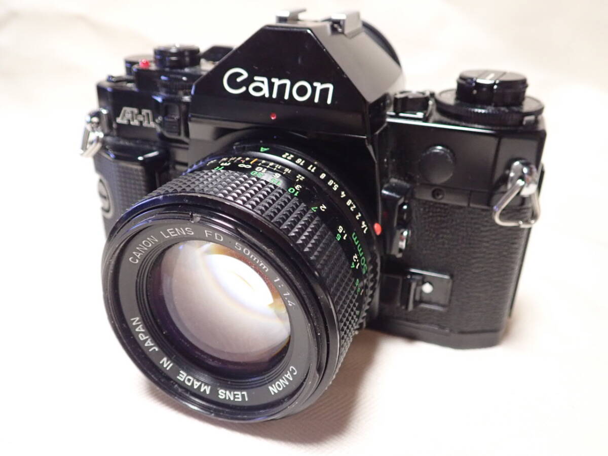 Canon キヤノン A-1 一眼レフフィルムカメラ + New FD NFD 50mm 1:1.4 レンズ_画像1