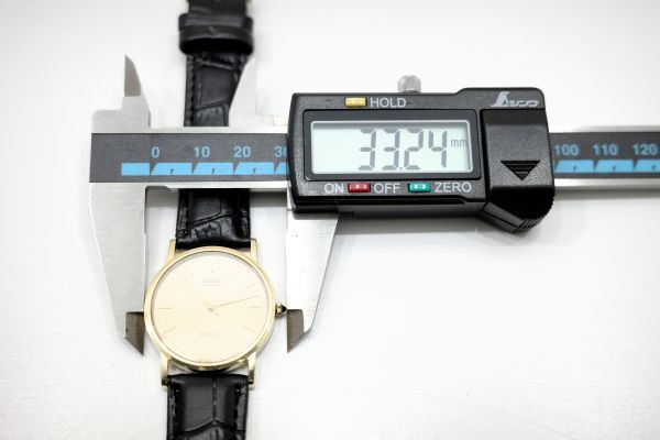 S5　SEIKO Dolce QZ 14K　　7731-7000　　セイコー ドルチェ 14金ケース 裏蓋 刻印 シャンパン文字盤 クォーツ メンズ 腕時計_画像6