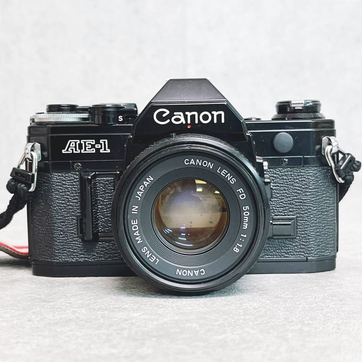キャノン AE-1 フィルム一眼レフカメラ ブラックボディ フィルター ストロボ その他付属品付き（CANON LENS FD 50㎜ 1：1.8）_画像2