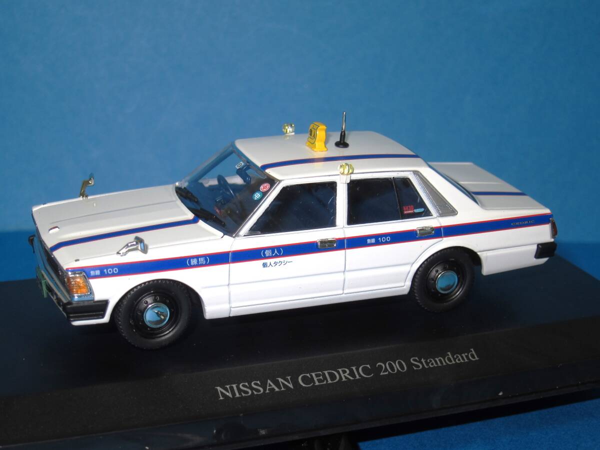 アオシマ DISM 1/43 ニッサン 430 セドリック 4ドアセダン 200スタンダード 前期型 個人タクシー 日産 タクシー 練馬 CEDRIC 1977年 の画像1