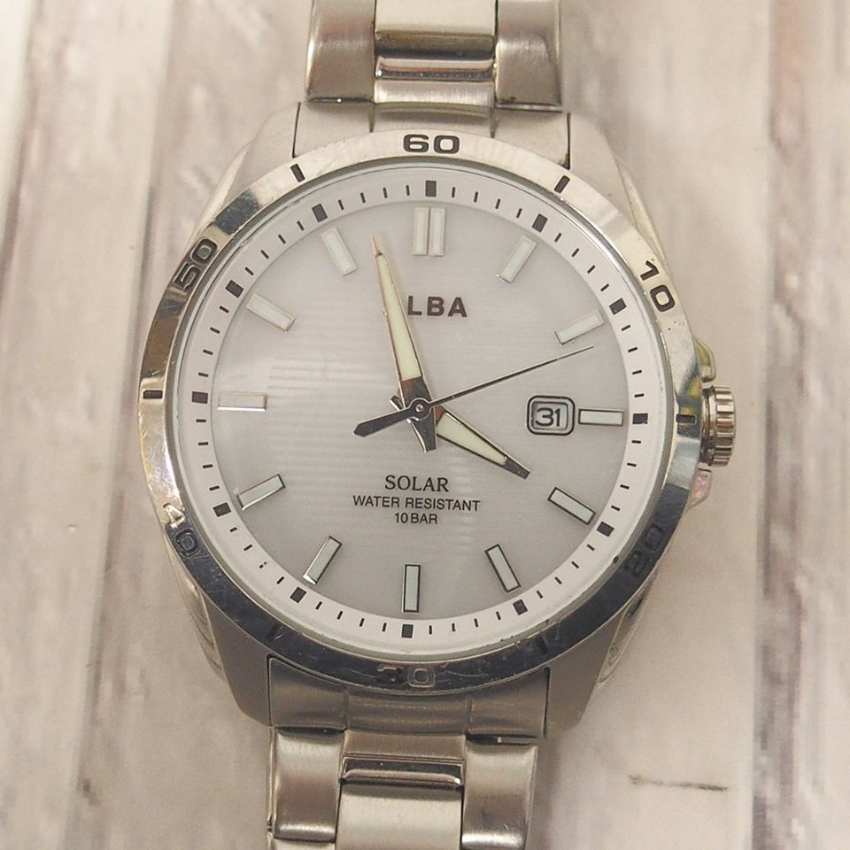 f002 Z5 4 セイコー SEIKO アルバ ALBA 10BAR 腕時計 ソーラー SOLAR クォーツ 白文字盤 ラウンド_画像2