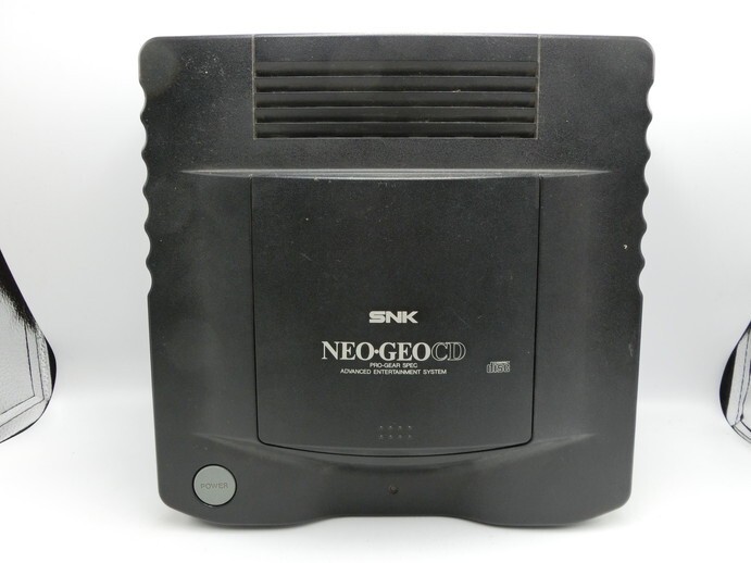 【HW75-35】【100サイズ】SNK NEOGEO-CD ネオジオCD ゲーム機本体のみ/CD-T01/ジャンク扱い/※傷汚れ有_画像1