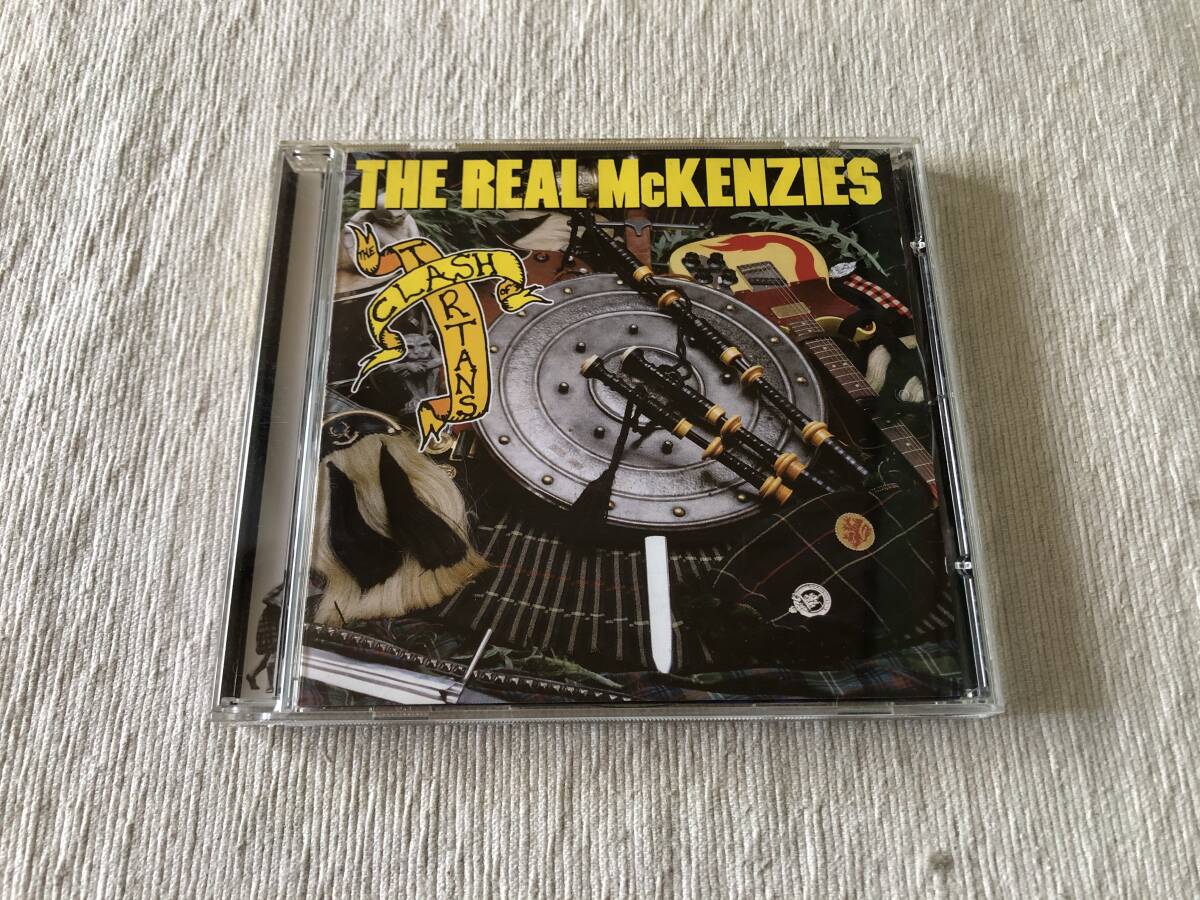CD　　THE REAL McKENZIES　　ザ・リアル・マッケンジーズ　　『CLASH OF THE TITANS』　　CDHOLE-029_画像1