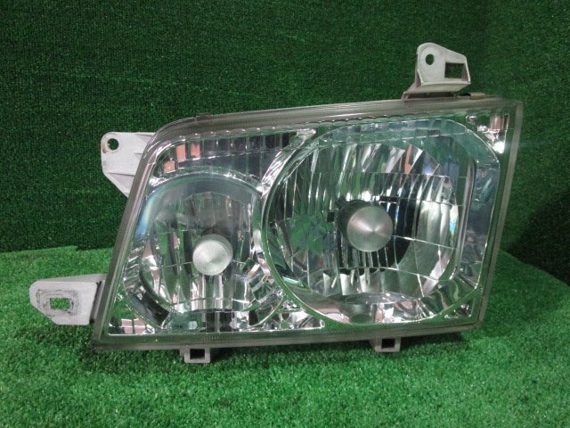 [A61025]* Titan W cab SYF6T left head light halogen 100-61569