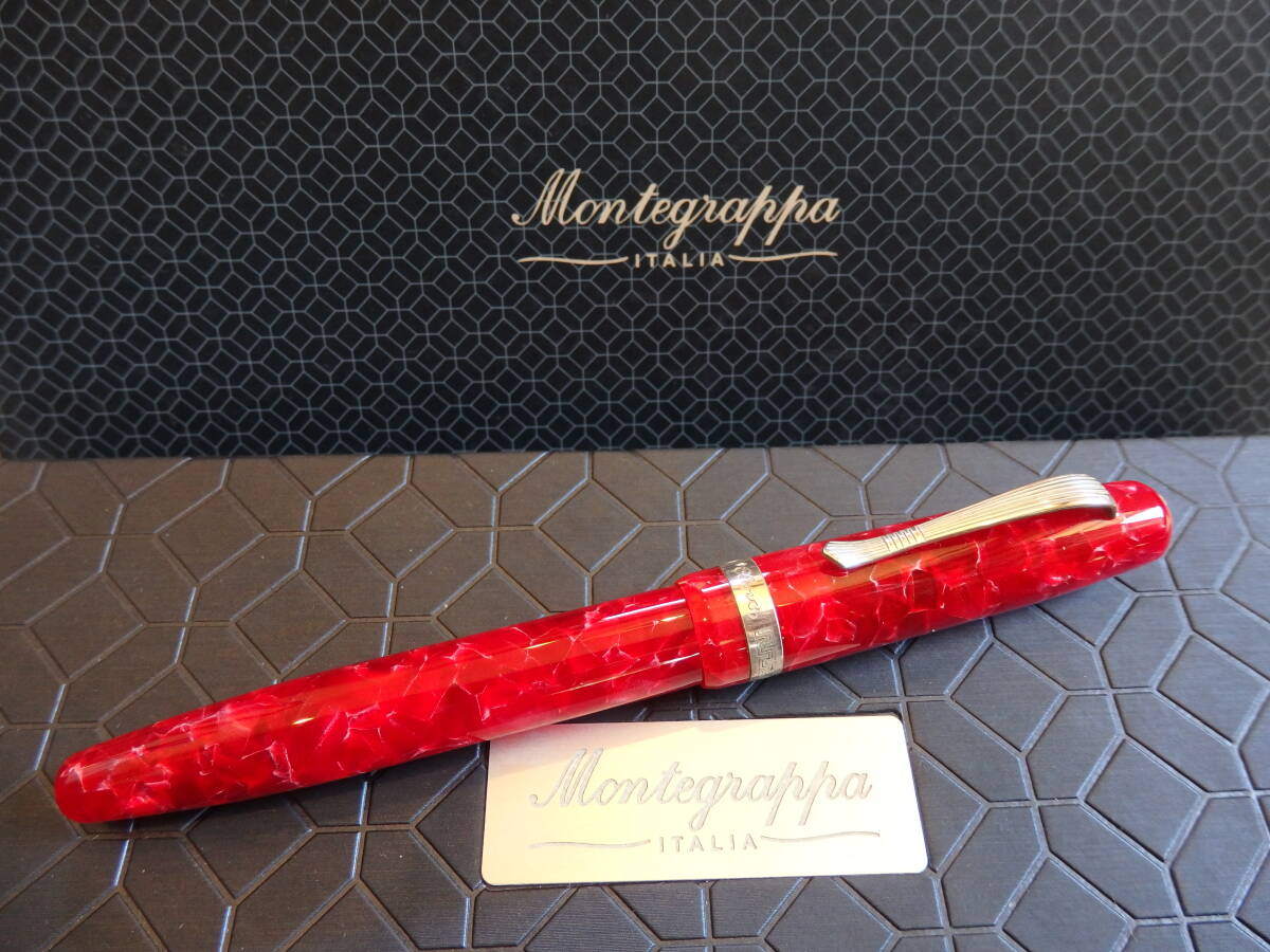 *[ unused . close ] Montegrappa Elmo Elmo red marble fountain pen pen .:18K750 solid Gold M