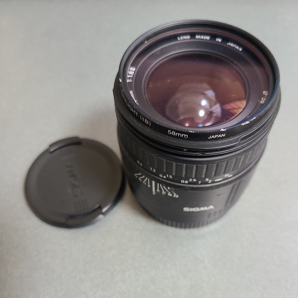 SIGMA CANON カメラレンズ 中古品 28mm ケンコースカイライトフィルター付き 現状品の画像1