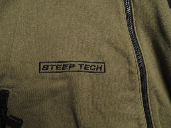 新品正規 ノースフェイス USA企画 アシンメトリー STEEP TECH HOOD PULLOVER ジャケット US:M アジア:L カーキ(KHA) 直営店購入 ラスト_画像7