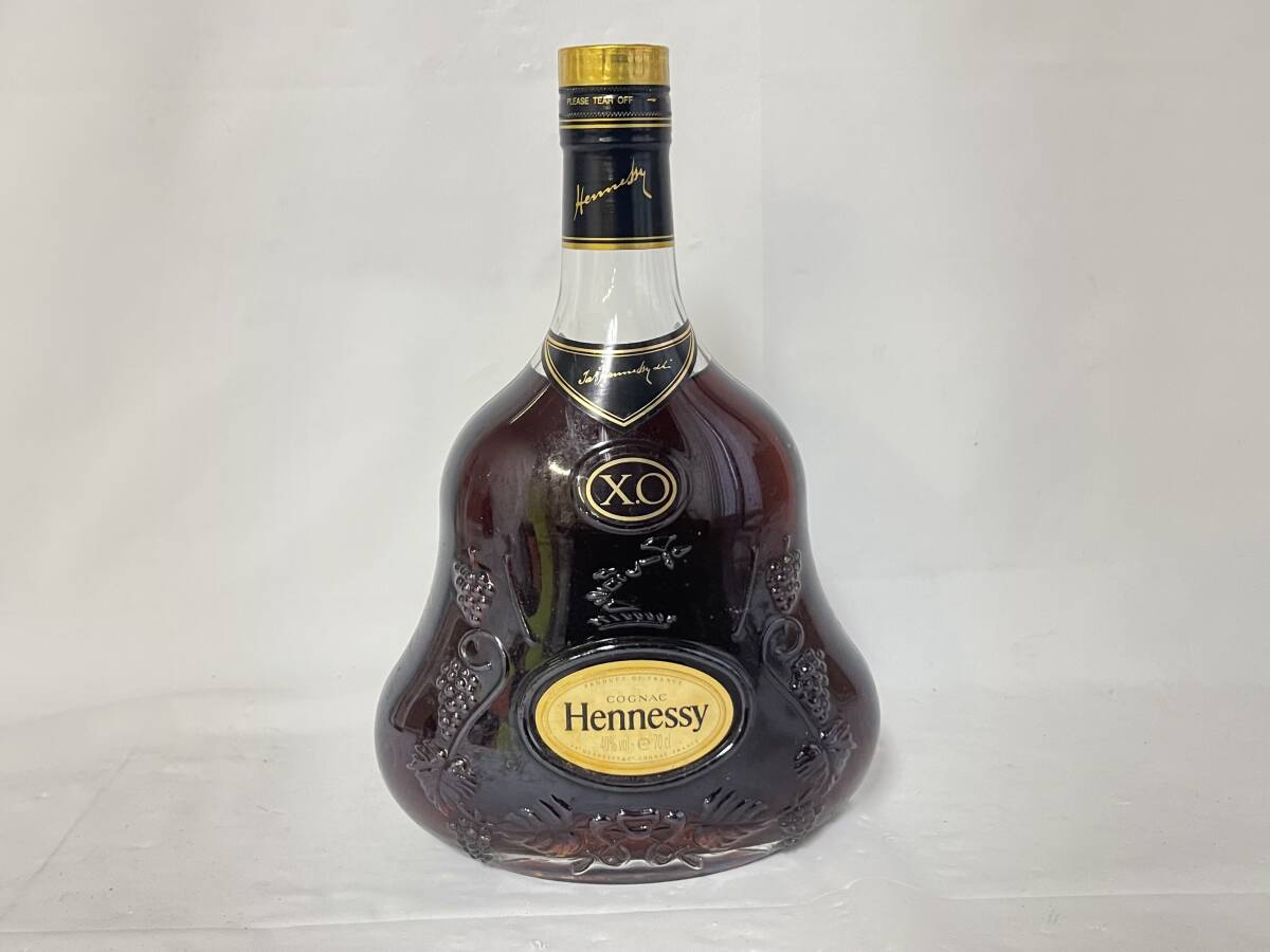 KF0602-76I　Hennessy　X.O　COGNAC　700ml　40％　ヘネシー　コニャック　ブランデー　クリアボトル　金キャップ　古酒_画像1