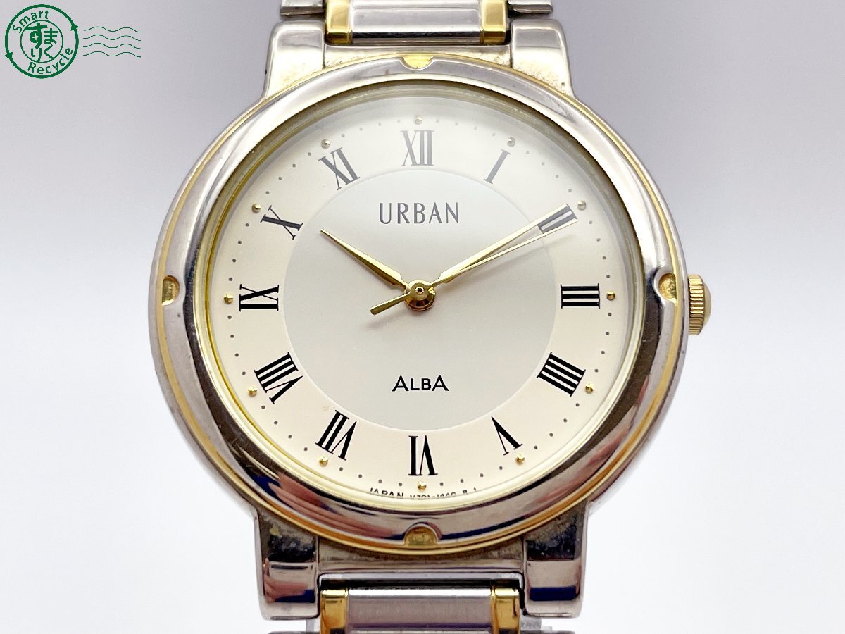 2403532187　＃ SEIKO セイコー ALBA アルバ URBAN V701-1390 クォーツ QZ 3針 アナログ 腕時計 アイボリー系文字盤 ヴィンテージ 中古_画像1