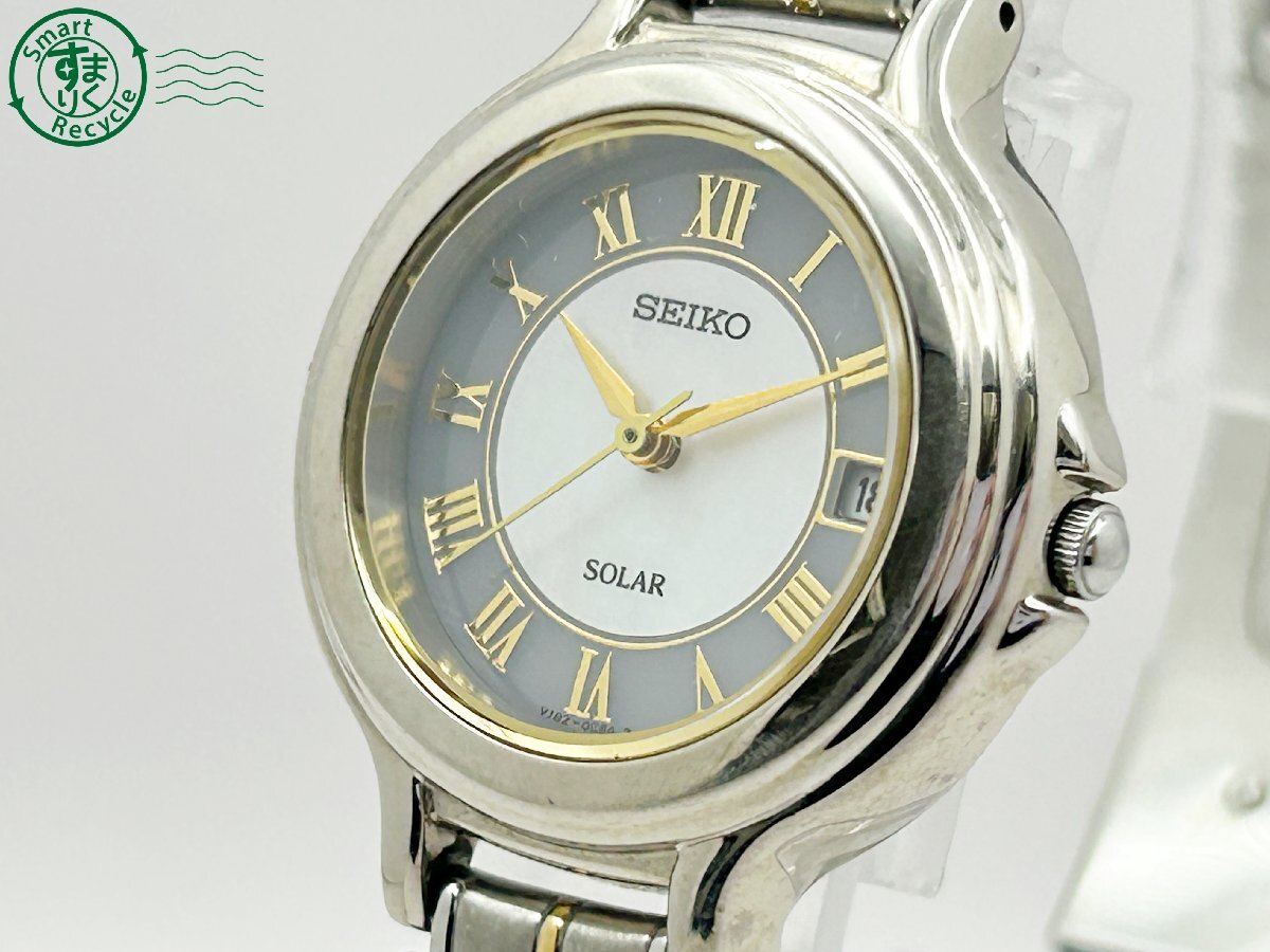 2403522390　◇ SEIKO セイコー V182-0C70 SOLAR ソーラー シェル文字盤 ゴールド デイト 刻印有り レディース 腕時計 中古_画像1