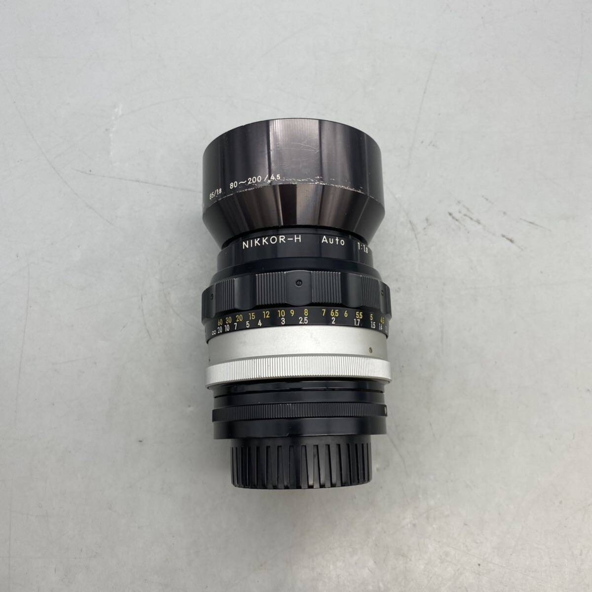 [C-24]Nikon Nikon summarize camera lens NIKKOR-H Auto 1:1.8 f=85mm lens hood HN-7 85/1.8 80~200/4.5 operation not yet verification 