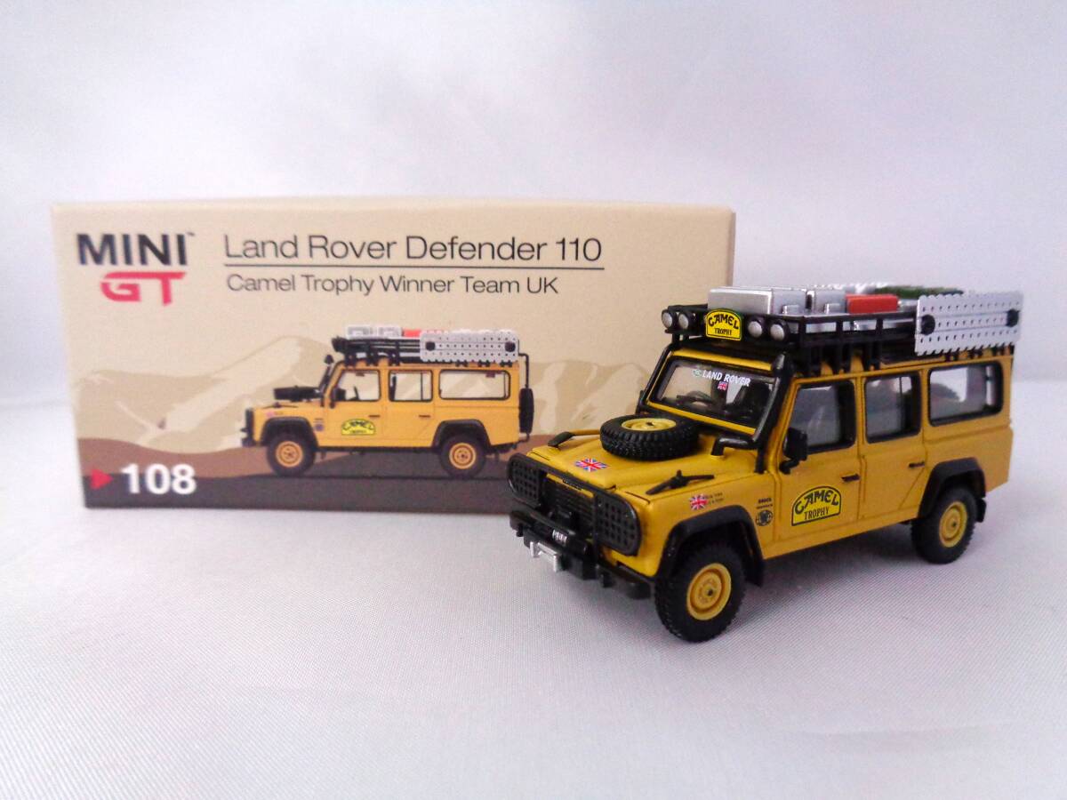 MINIGT MINI GT 1/64 Land Rover Defender 110 Camel Trophy Winner Team UK RHD ランドローバー ディフェンダー 108の画像1