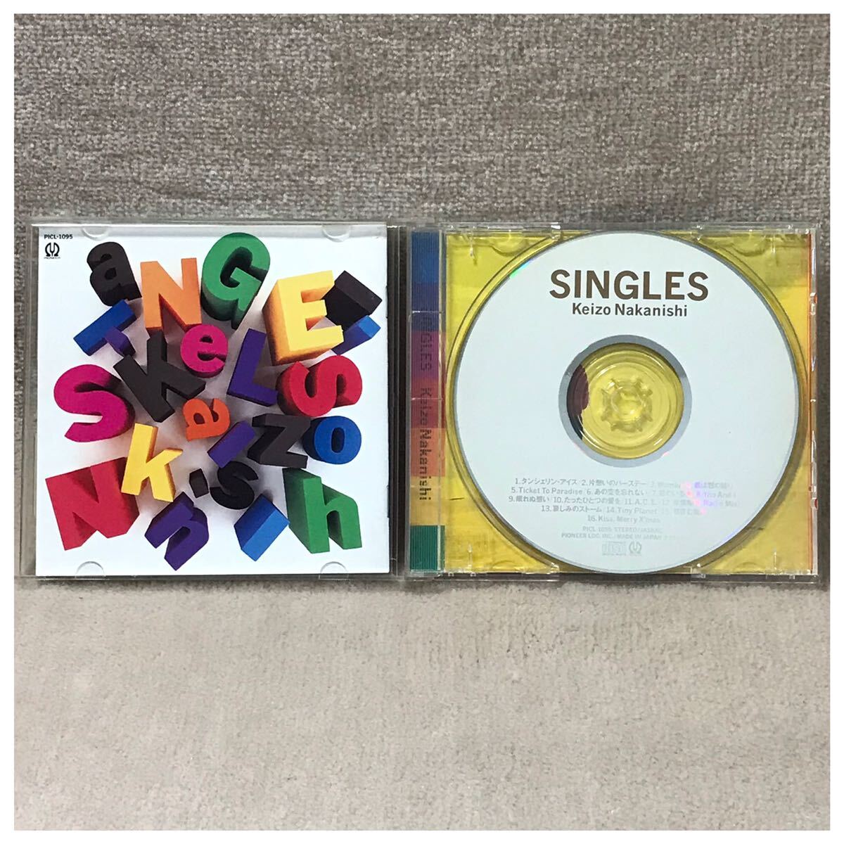 SINGLES / 中西圭三