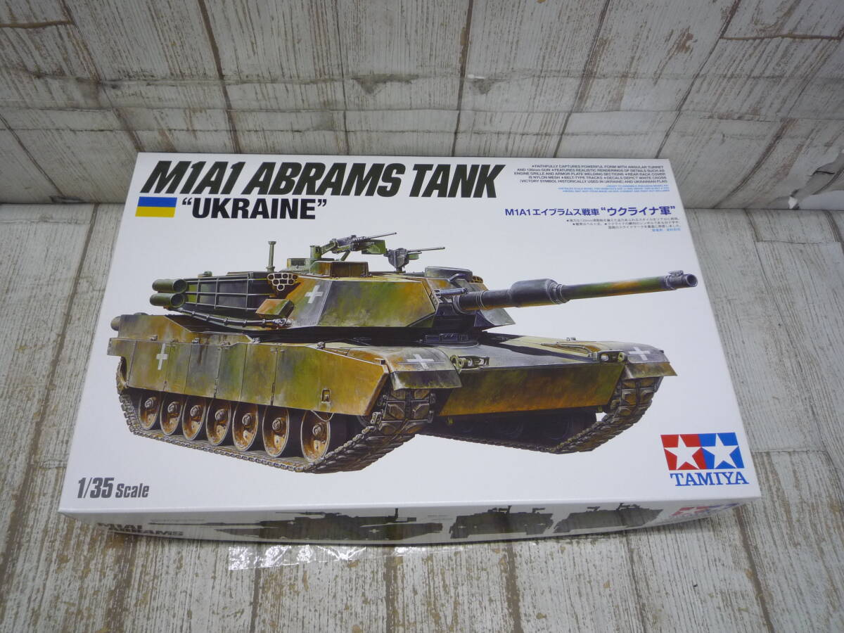 Hd9904-100♪【80】未組立 タミヤ 1/35 M1A1エイブラムス戦車 ウクライナ軍の画像1