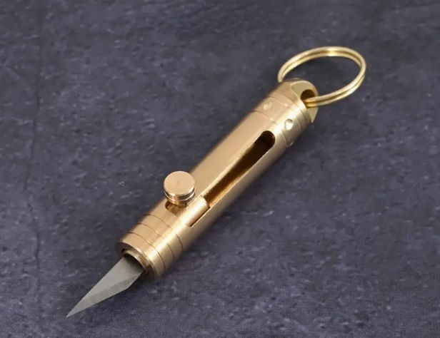  super compact cutter key chain camp outdoor travel quite a bit breaking the seal . very convenience pocket knife 