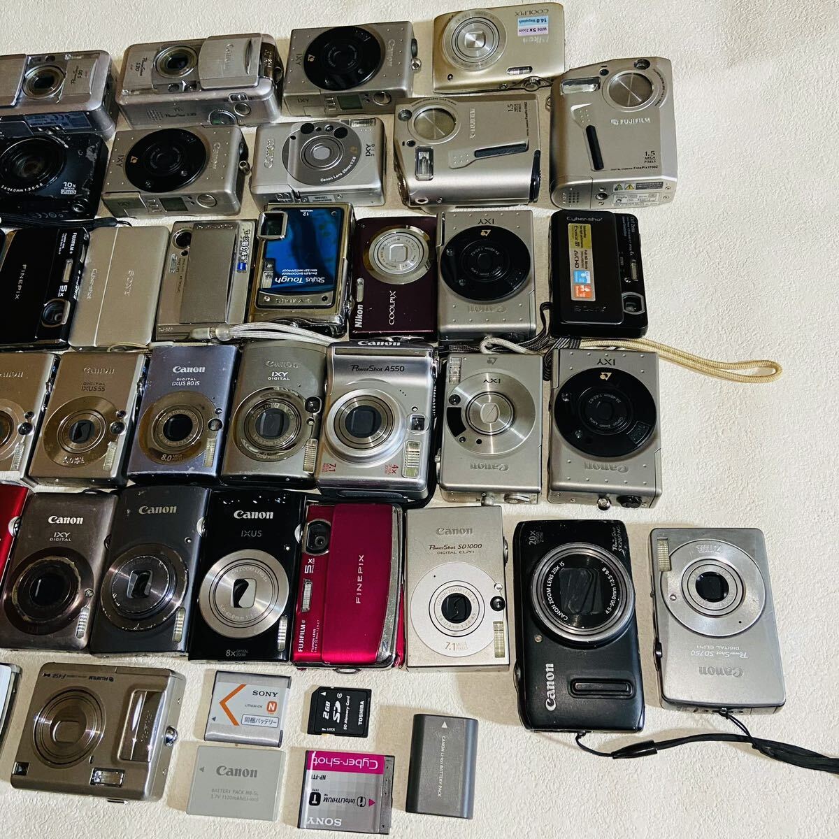 デジタルカメラ、大量、キヤノン、ニコン、オリンパス、富士フイルム等、FinePix、POWER SHOT IXY、EXILIM、中古品36点(M002)の画像5
