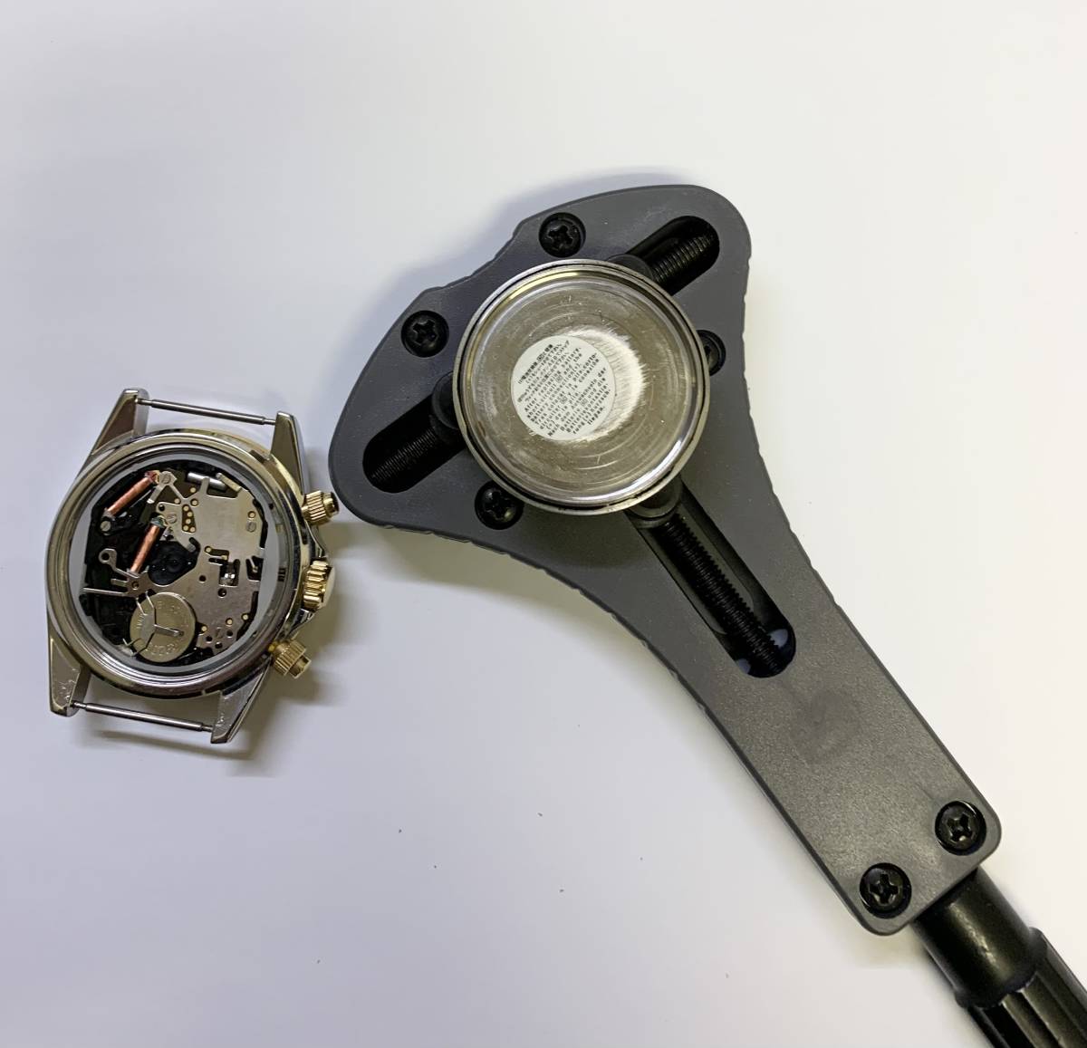  with translation wristwatch three point main . opener large wristwatch correspondence reverse side cover remove clock tool screw back opener including carriage 