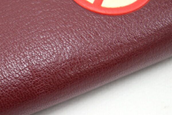  Anya Hindmarch round fastener long wallet bordeaux leather used long wallet purse ribbon no smoking Mark tassel 