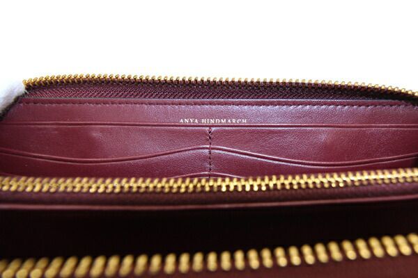  Anya Hindmarch round fastener long wallet bordeaux leather used long wallet purse ribbon no smoking Mark tassel 